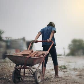 child labor in building commercial building structures. world labor day concept